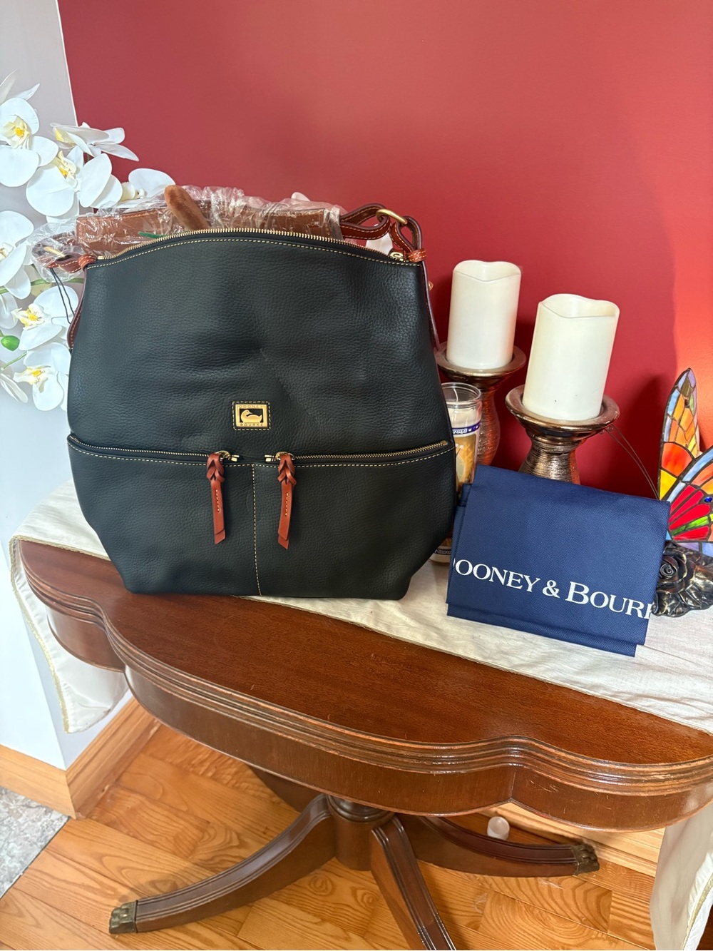 Dooney & Bourke Black Pebbled Leather Backpack with Brown Trim